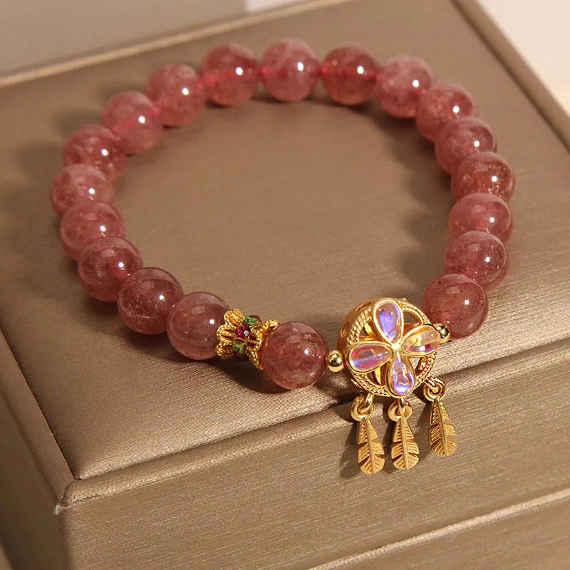 Natural strawberry quartz bracelet with four leaf clover dream catcher pendant on adjustable cord