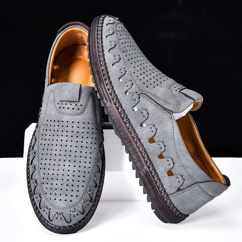 Men's brown hand-sewn PU slip-on casual shoes with a flat sole and round toe.