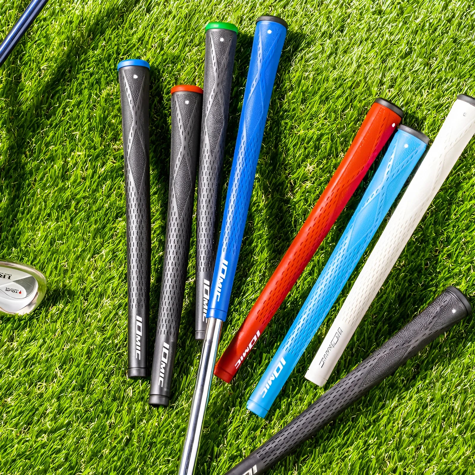 TPE golf club grip showing colour options including pink, red, blue, white, and black variations