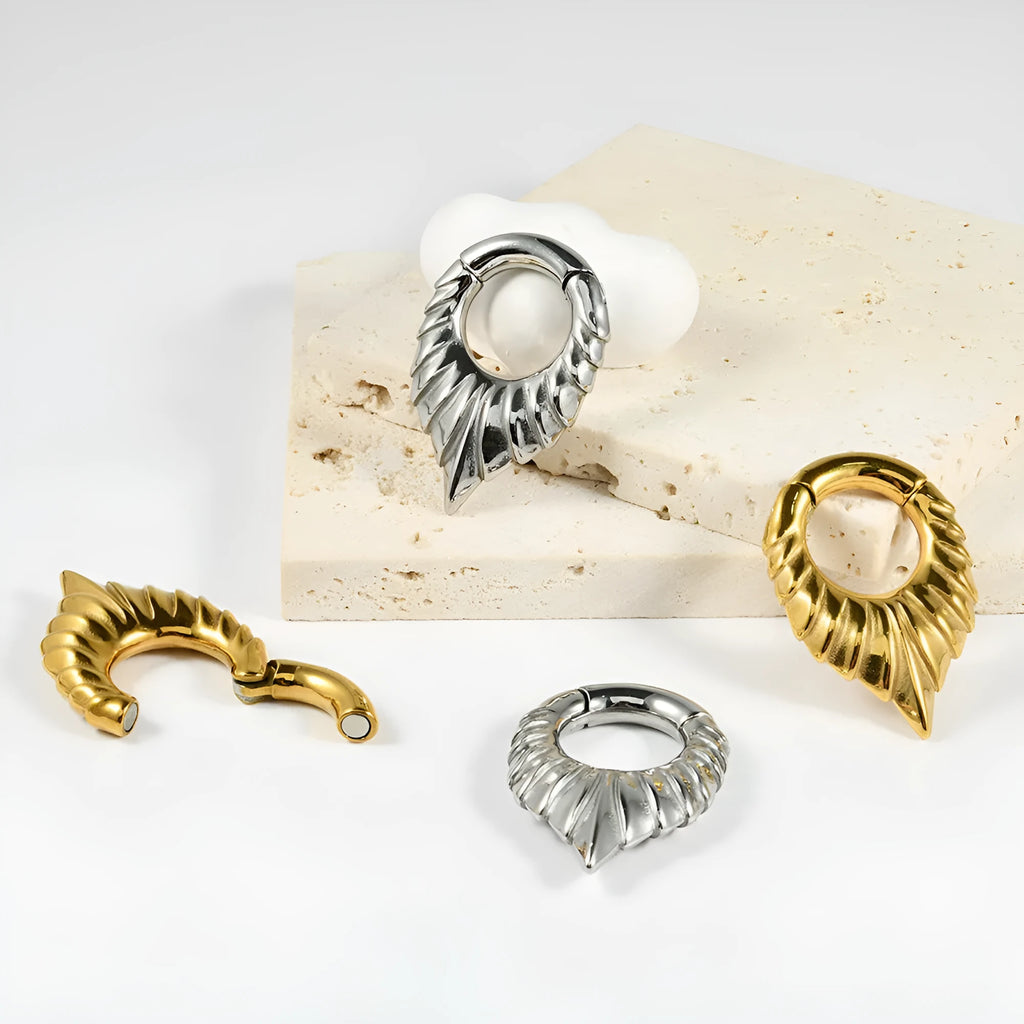 Stainless steel drop-shaped ear extender with round hanging egg totem design