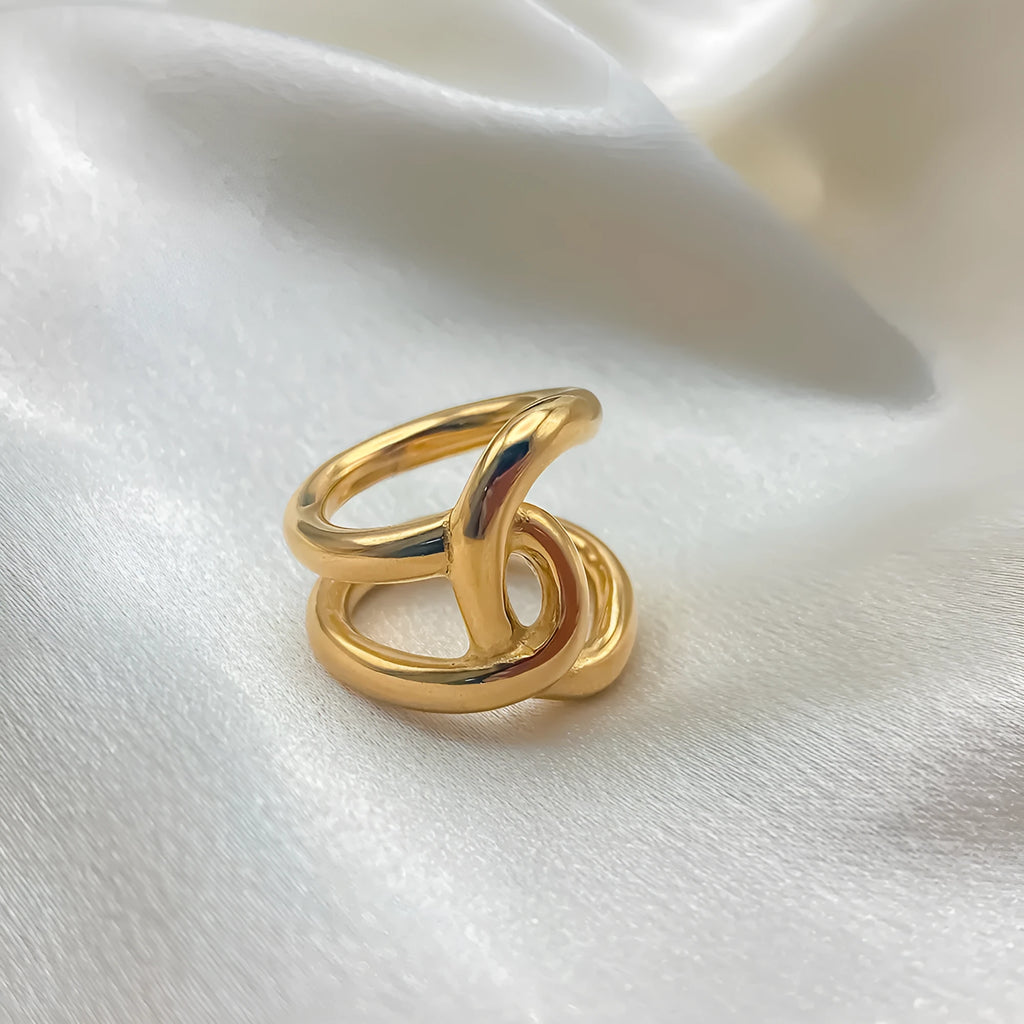 Adjustable knotted ring for women in stainless steel with gold or steel colour finish