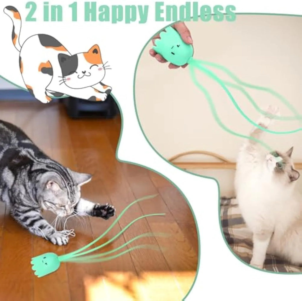 Green automatic electronic cat wand toy with swinging silicone tails on a table.