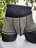 Men's thin fabric boxer shorts in solid colours showing hip lifting design