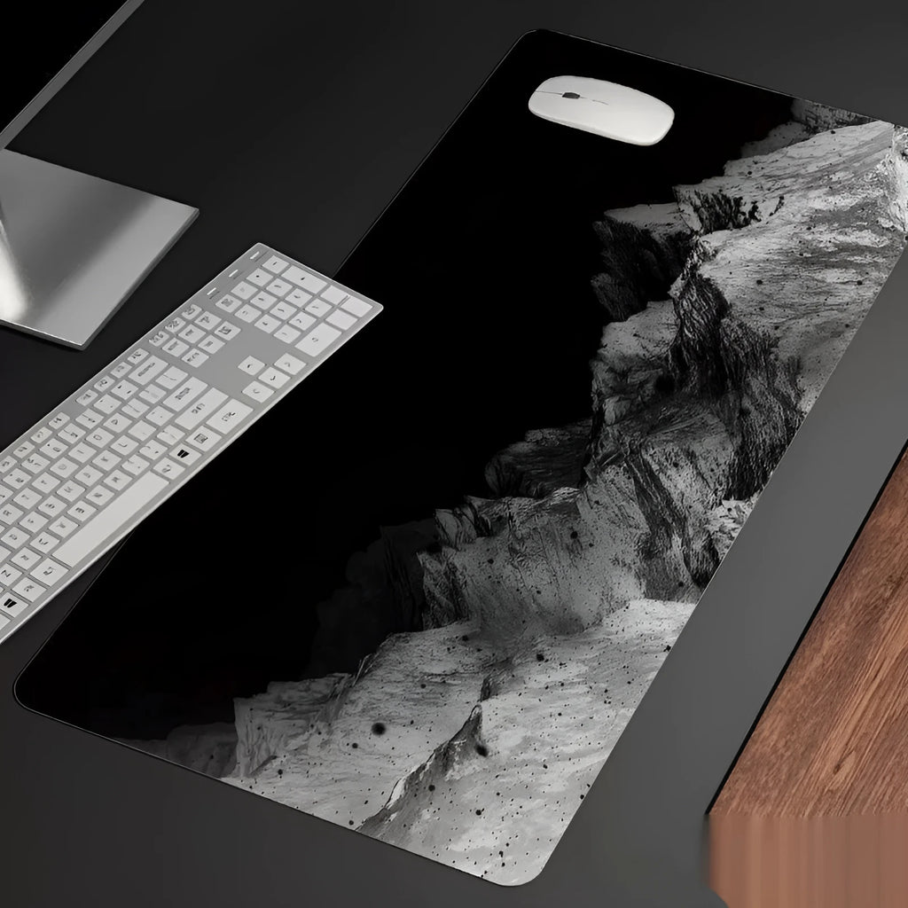 Oversized natural rubber mouse pad with wrist rest in gaming design on desk