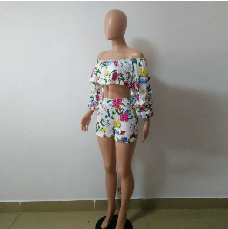 Women's two-piece pyjama set with fleece-lined sleeves and multicolour digital geometric print