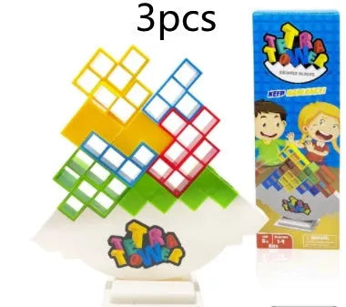 Plastic balance stacking game with 16 coloured building blocks on chassis