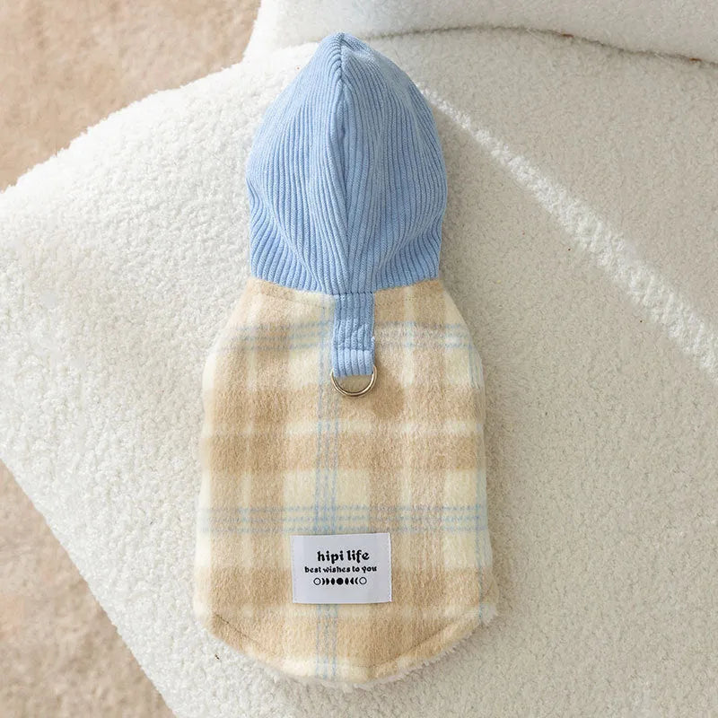 Blue corduroy dog vest with chessboard grid pattern and a hooded traction design.