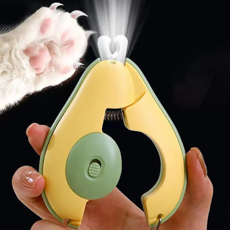 Professional pet nail clipper with LED safety light for trimming small dog and cat claws, shown in green colour.