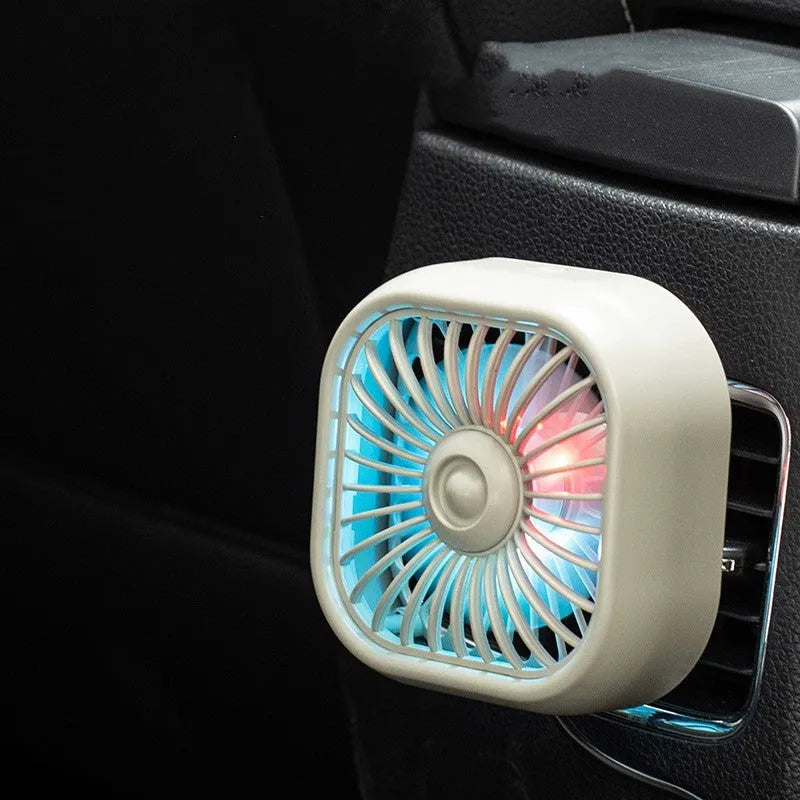 Black USB car fan with three speed buttons on compact base for vehicle ventilation