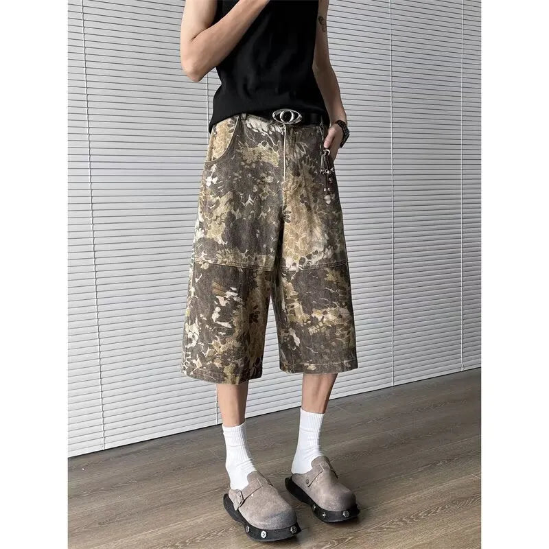 Yellow denim jeans with snake camouflage pattern, cropped length design