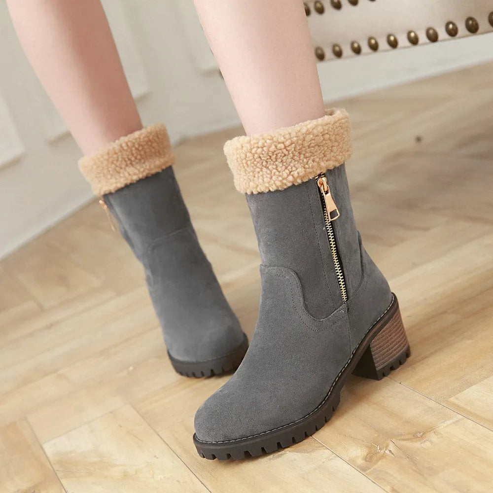 Snow boots in black, grey, green, or orange with a short plush lining and rubber insole