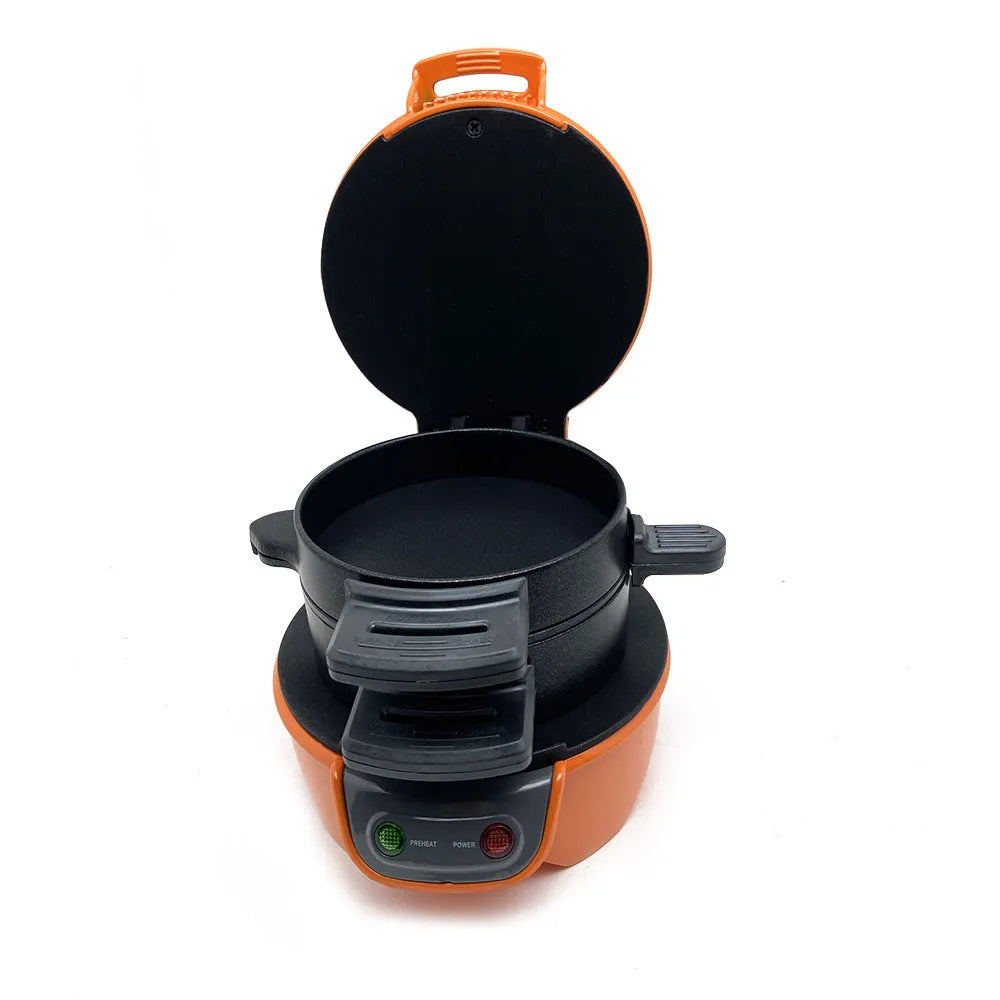 Bright red breakfast sandwich maker with egg cooker ring and baking trays on kitchen counter