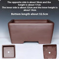 Square purple clay bonsai pot measuring 24cm with classical design for succulent plant display