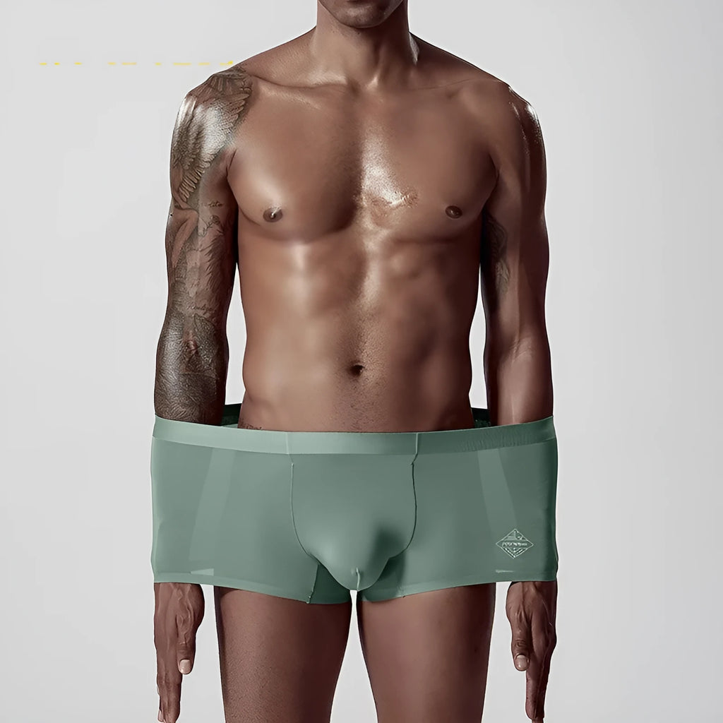 Seamless modal men's underwear brief in green colour showing mid-waist fit