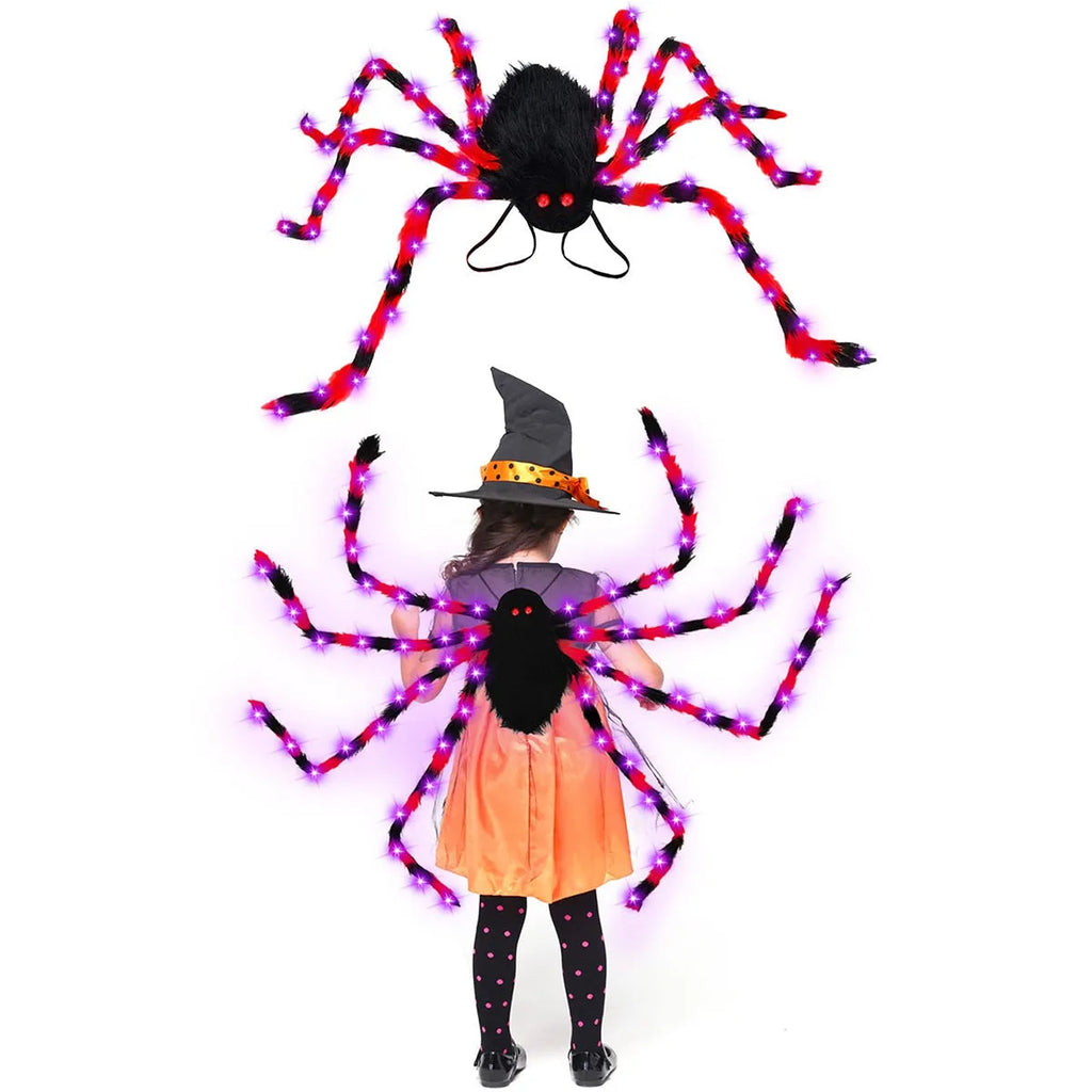 Halloween spider backpack with LED lights in plush sugar bag design shown in orange purple light colour