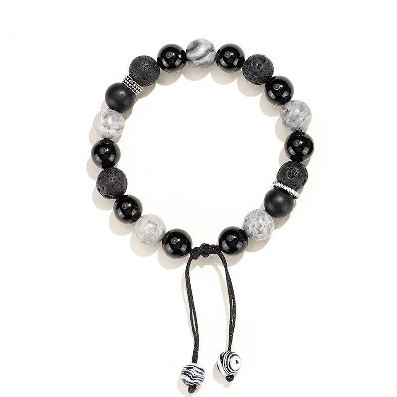 Black agate map stone diamond-shaped volcanic rock bracelet with electroplated finish.