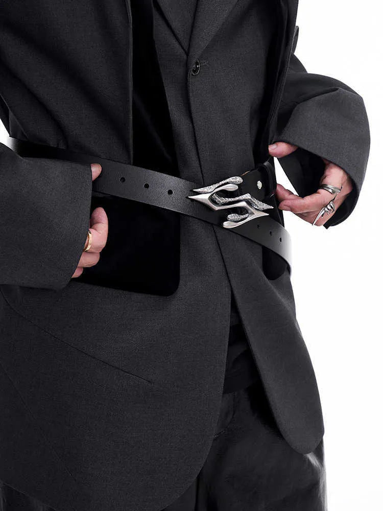 Black men's leather belt with metal letter detailing showing two-layer cowhide construction and adjustable buckle