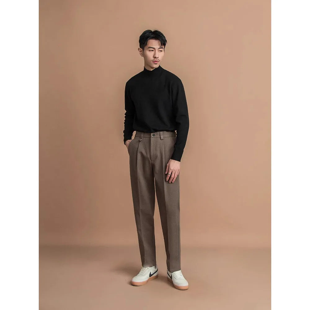 Men's straight-leg suit trousers in black, brown, grey, or khaki, shown on a model.