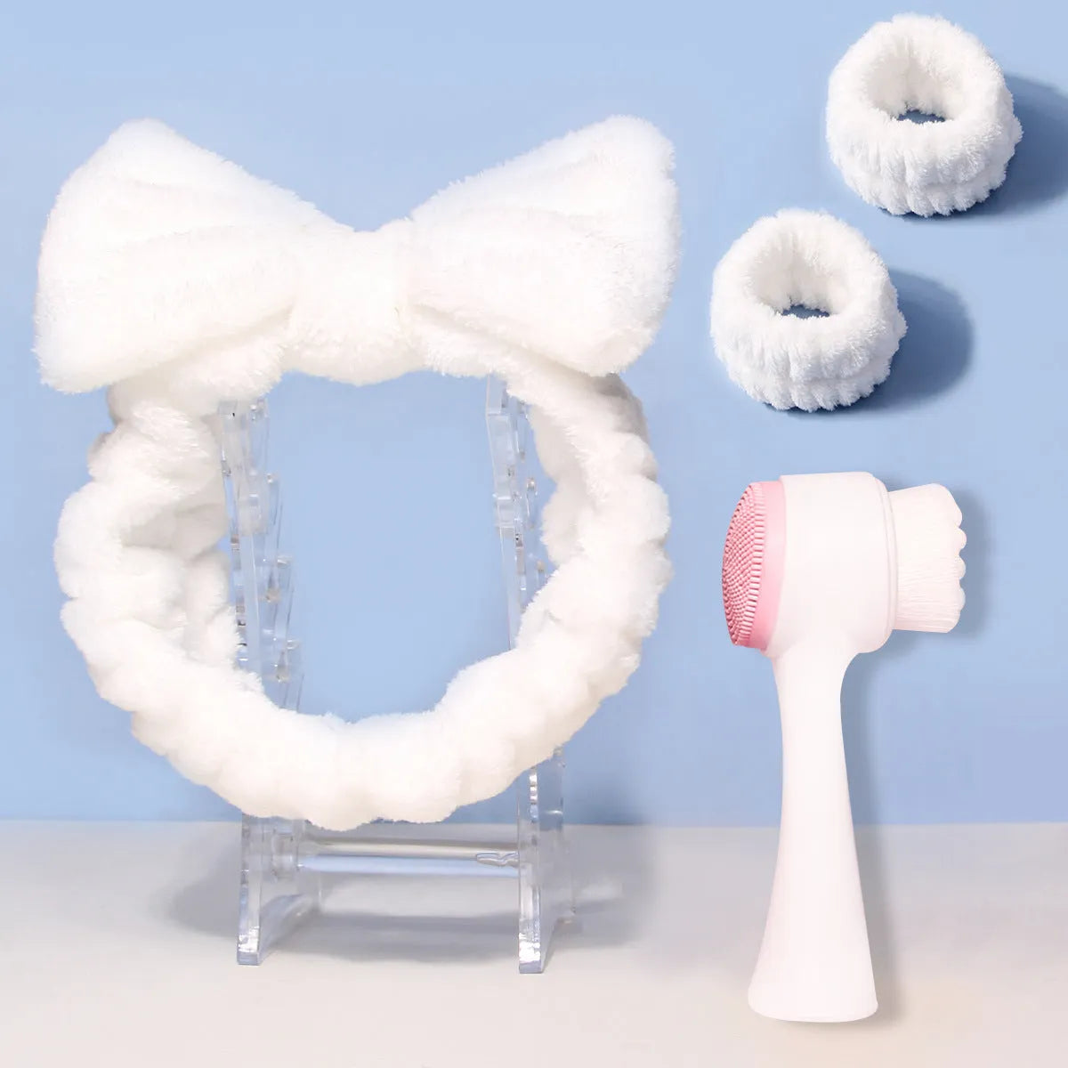 Facial brush set with keep dry hair band, plastic handle brush and four replacement brush heads