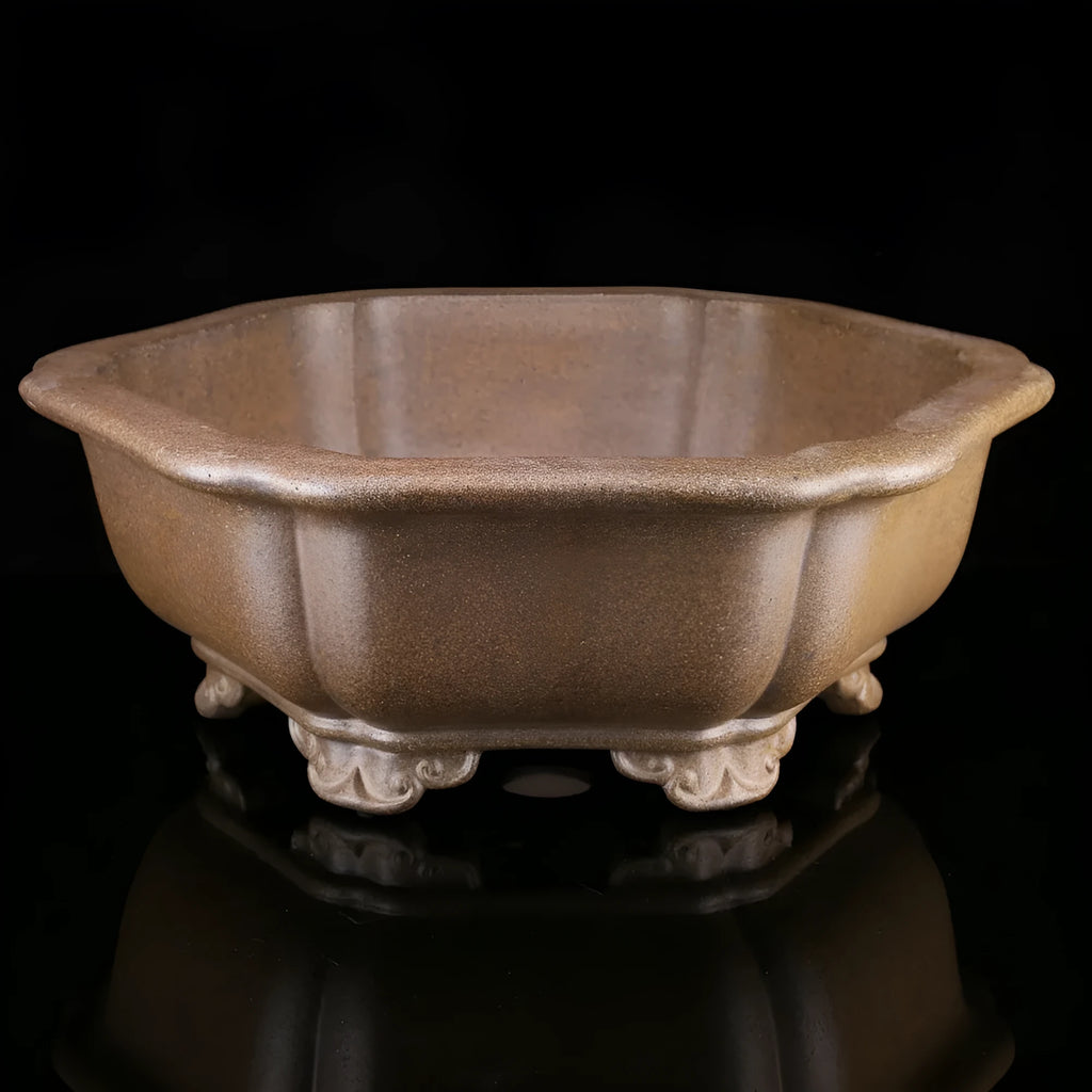 Handmade tea-coloured purple sand flower pot in a large hexagonal or begonia basin shape.