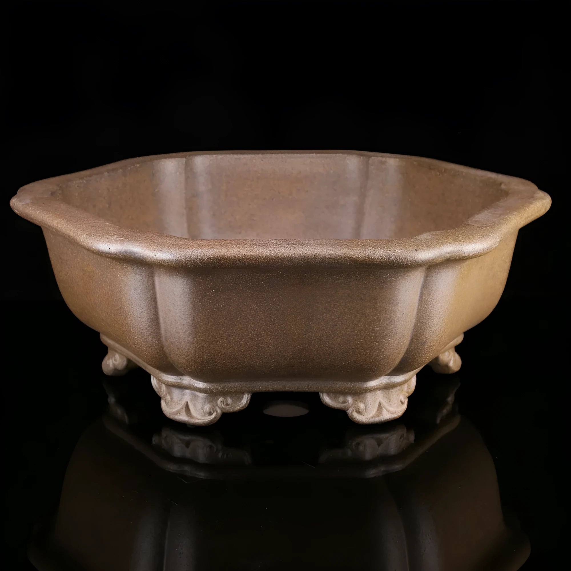 Handmade tea-coloured purple sand flower pot in a large hexagonal or begonia basin shape.