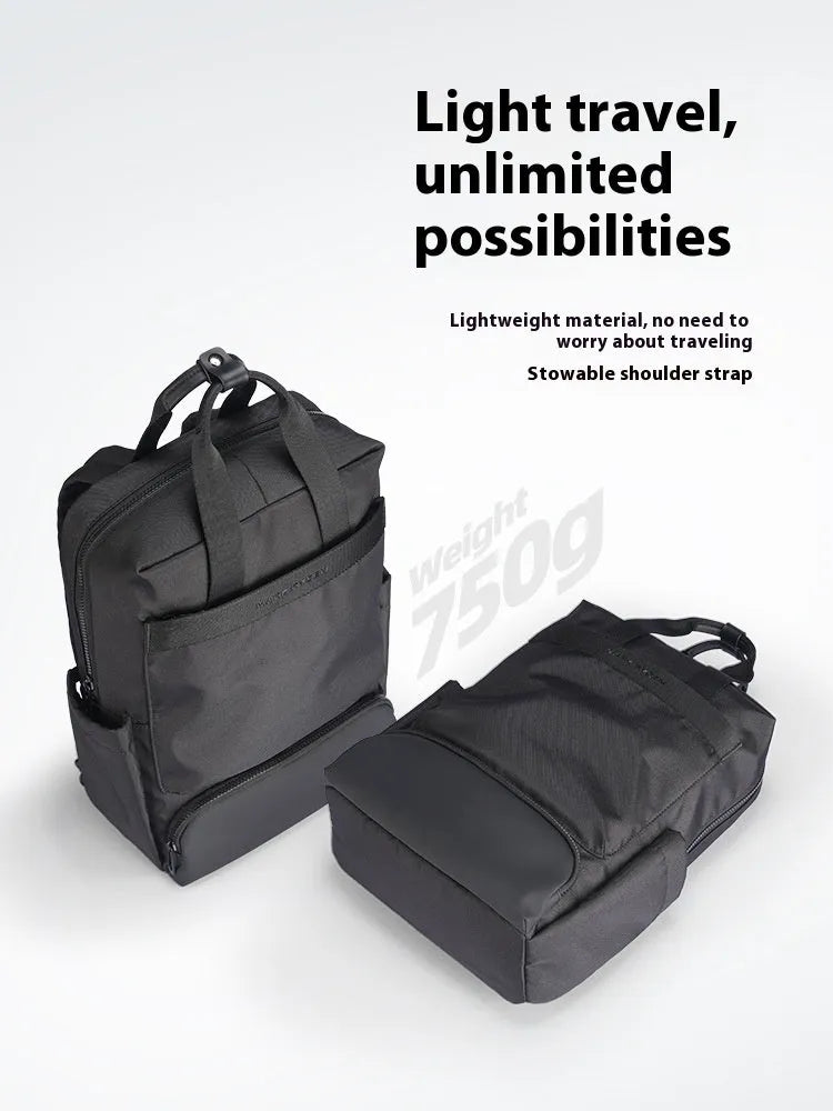 Black Oxford cloth computer backpack showing main compartment and 20-35L capacity.