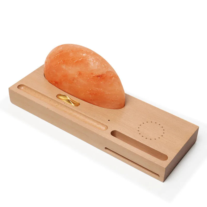 Sunrise Oriental natural crystal salt lamp with beech wood base and integrated wireless phone charging pad
