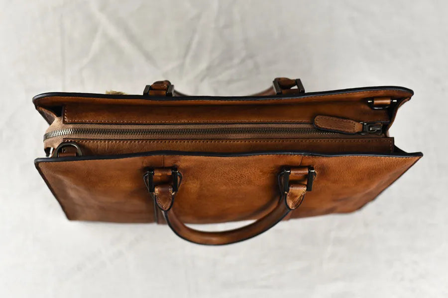 Men's 14-inch horizontal leather handbag in khaki or black with zipper closure