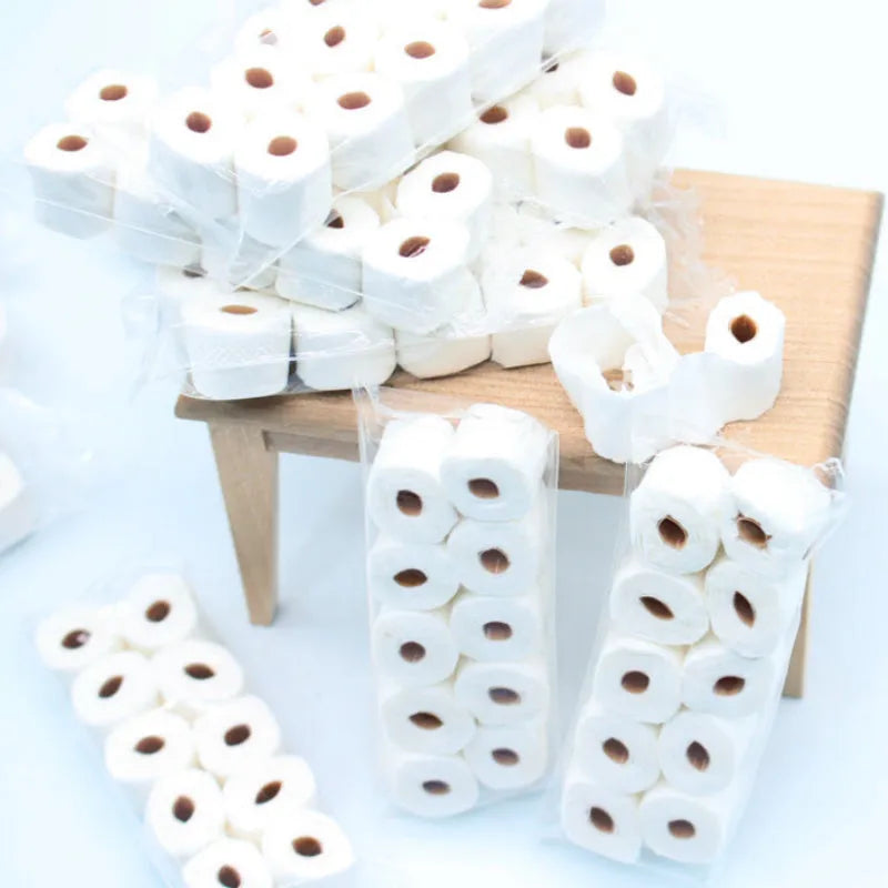 Miniature paper simulated toilet roll model for childrens toys, measuring 30mm by 15mm by 80mm.