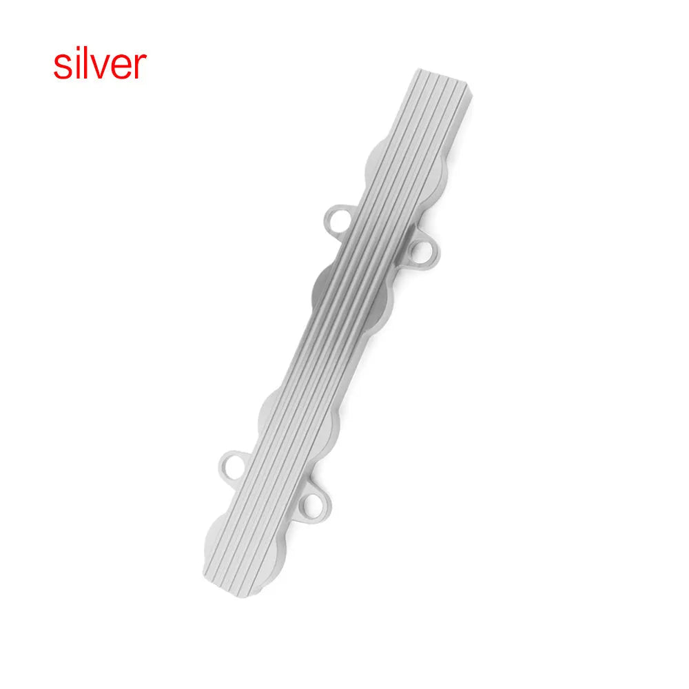 Aluminium alloy engine harness housing bracket in blue, red, and silver, showing versions with and without mounting holes.