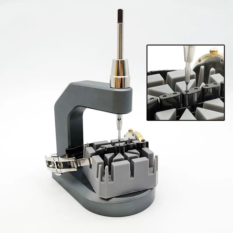 Silver tool steel press strap removal tool with 0.50-1.60mm blade specification on a work surface.
