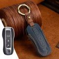 Authentic cowhide leather Porsche key cover with retro buckle closure in blue colour