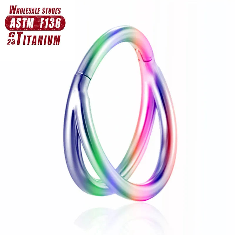 Titanium alloy L-shaped fork nose ring in silver, gold, black, rose gold and colourful finishes on a white background.