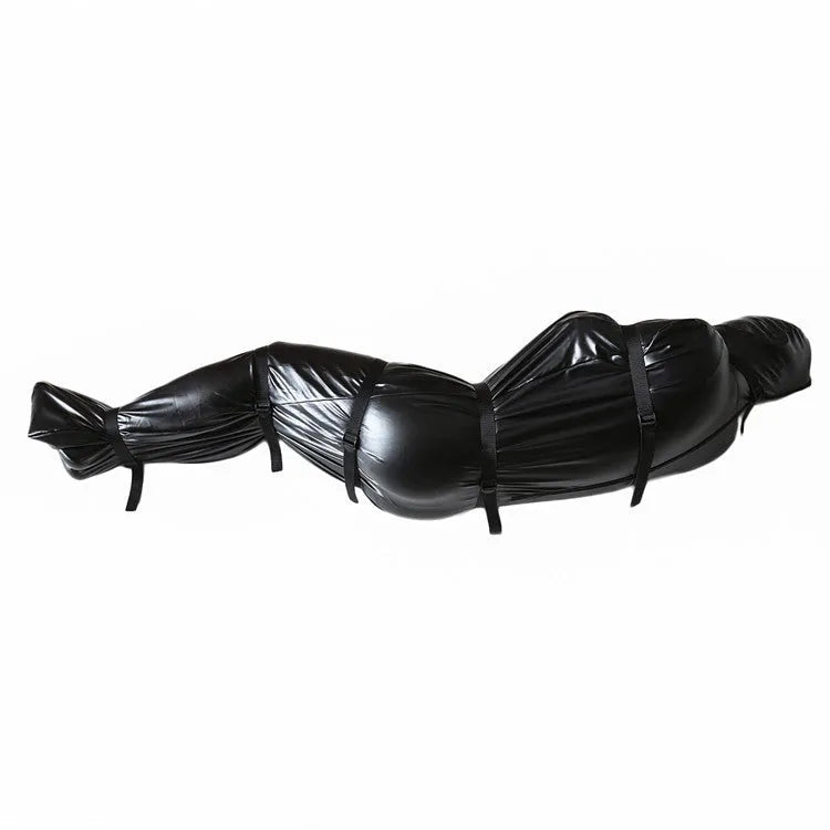 Black patent leather bondage set showing nostril clothing piece and six ratchet tie down straps