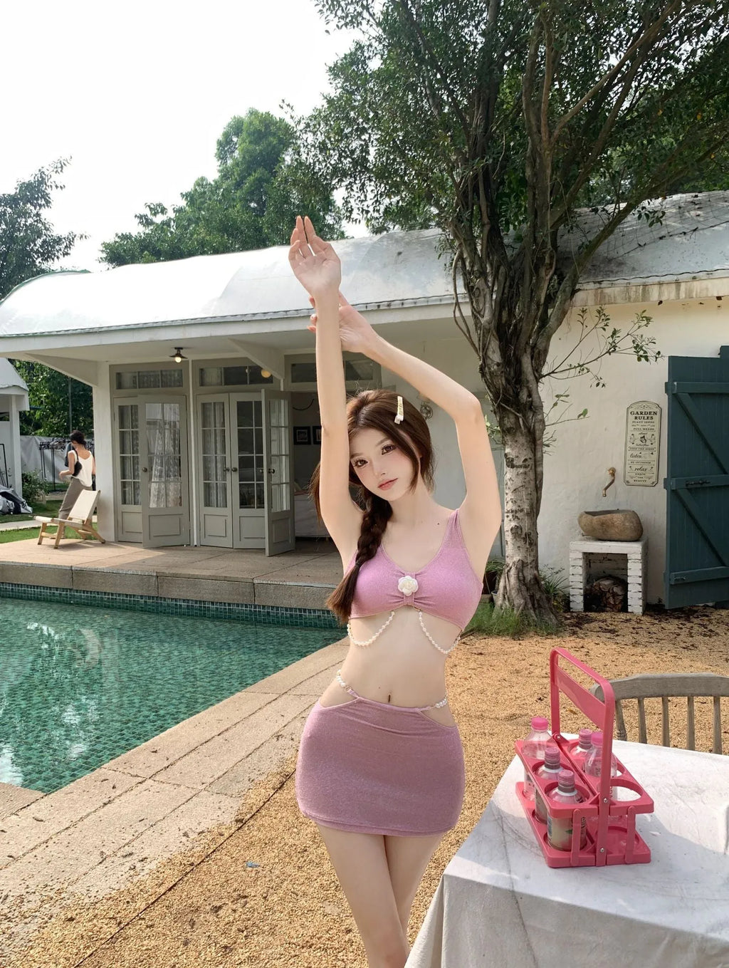 Bear Vacation pink and black three-piece polyester bikini set for women.