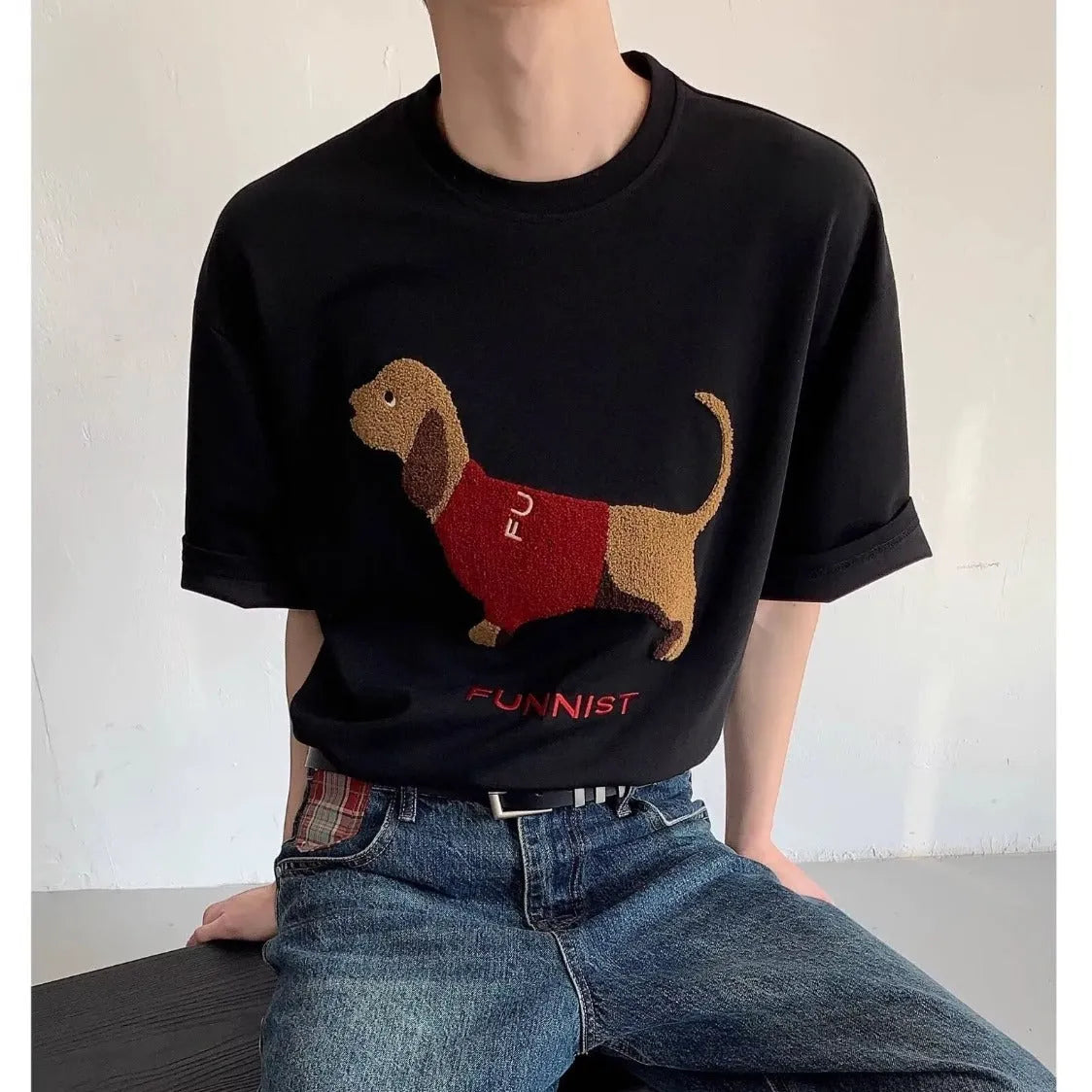 Grey men's cotton t-shirt with a detailed embroidered sausage dog design on the chest.
