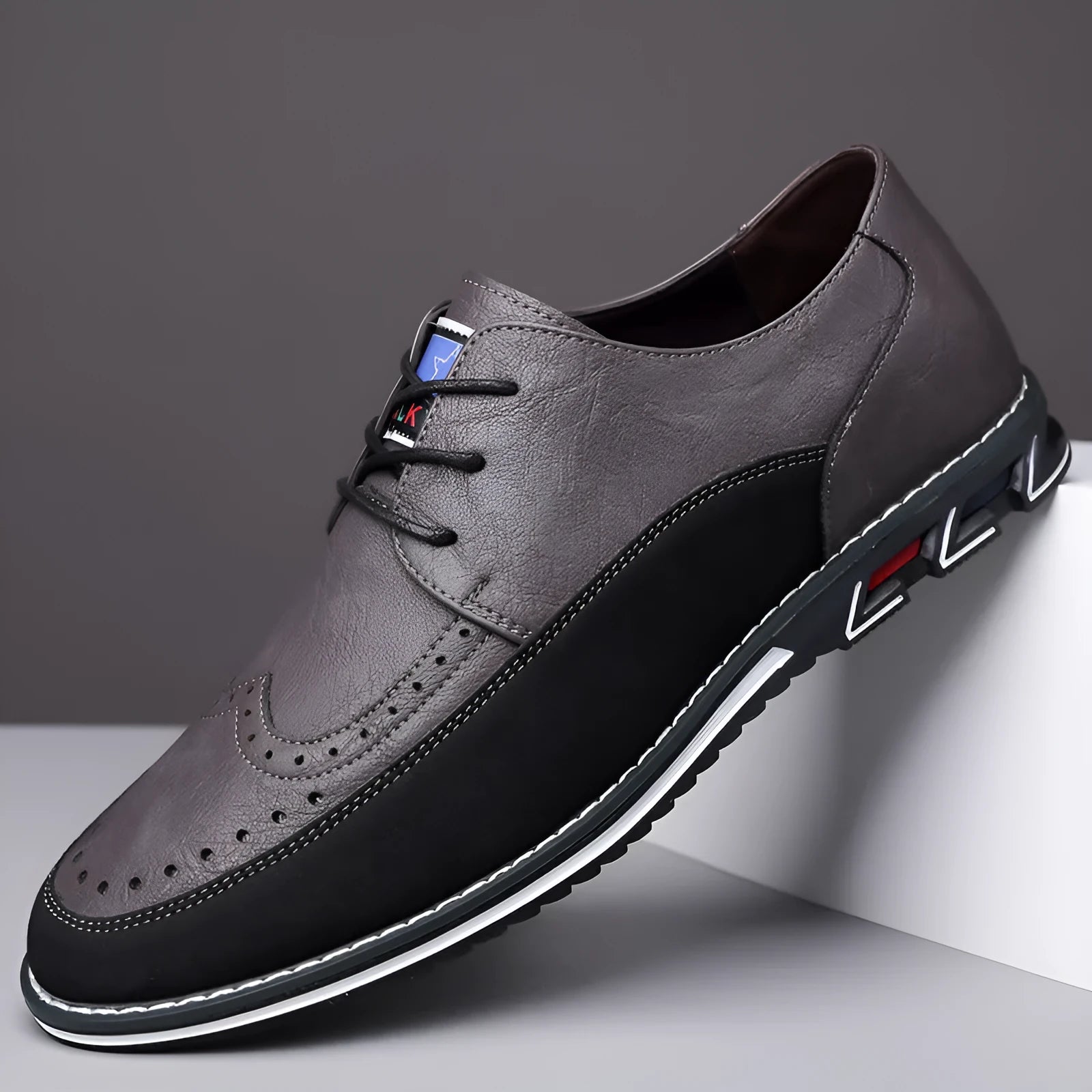 Men's low top leather casual shoe with rubber sole and leather toe cap in multiple colours.
