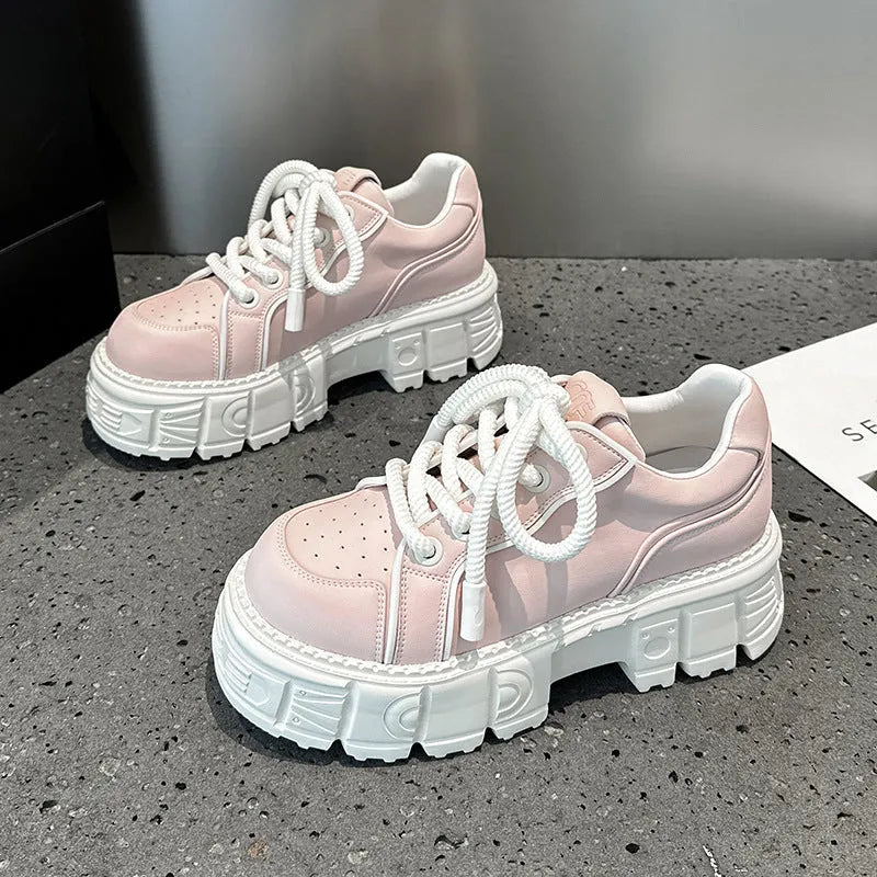 Women's beige and pink casual leather shoes with a height-increasing sole.