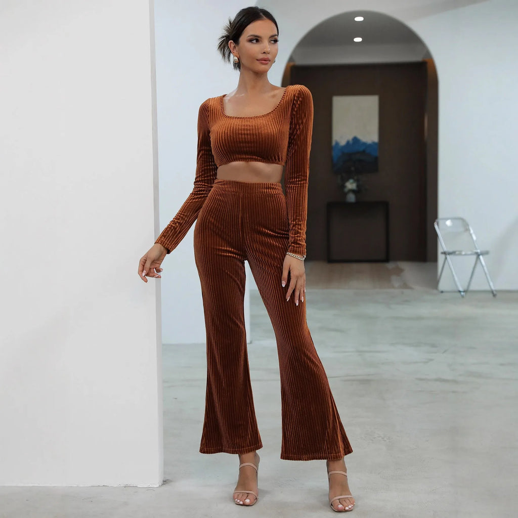 Caramel coloured long sleeve sweater set with matching trousers on hanger
