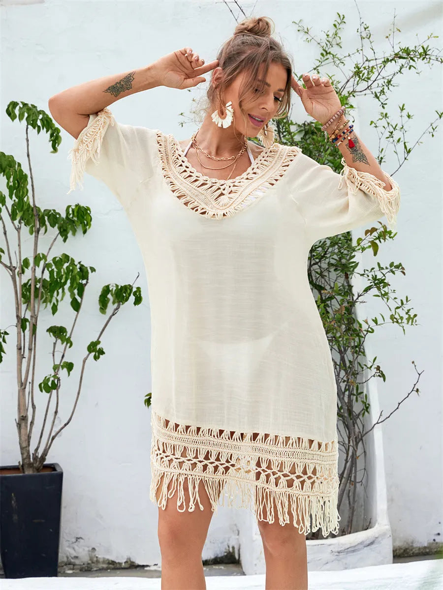 Apricot coloured women's long hand-crocheted beach dress with lining for swimming.