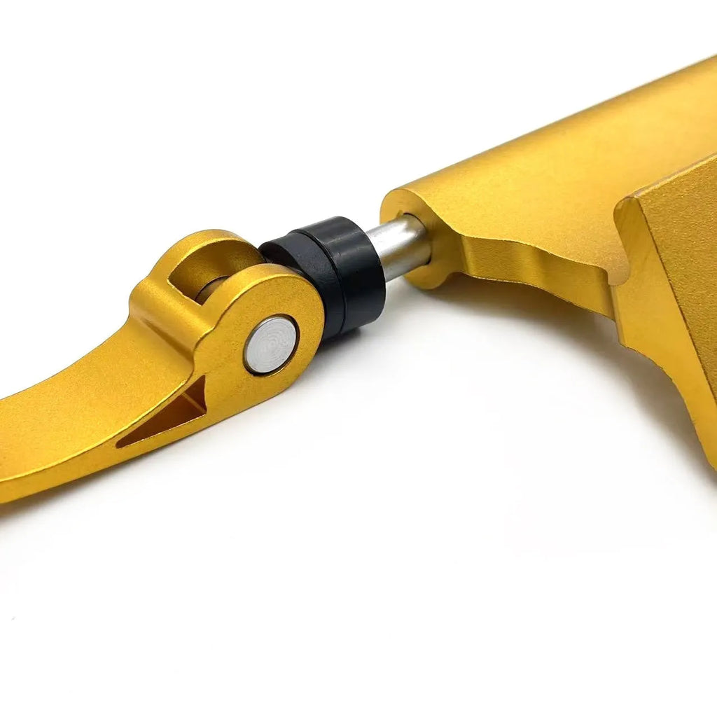 Silver metal quick release bicycle clamp for front fork accessory mounting.