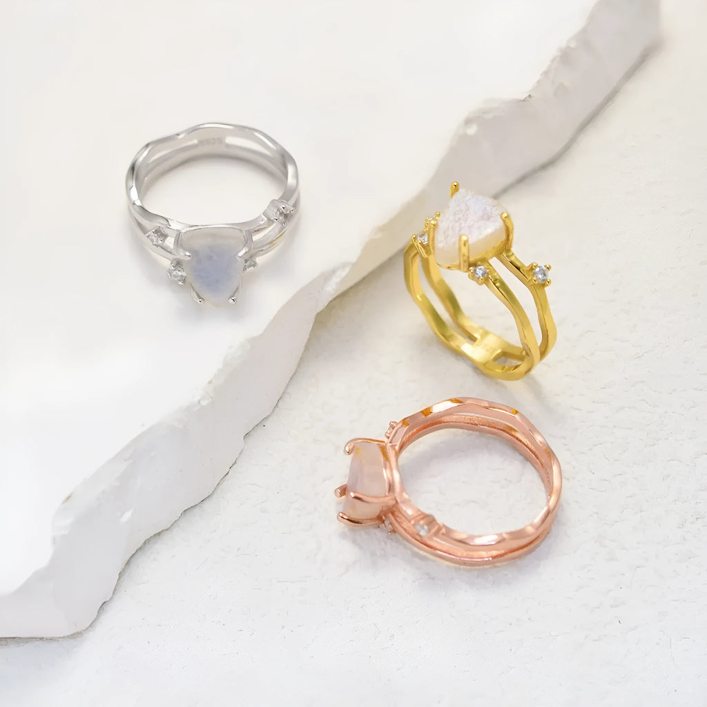 S925 sterling silver irregular triangle ring with moonstone in rose, white, or yellow gold finish.