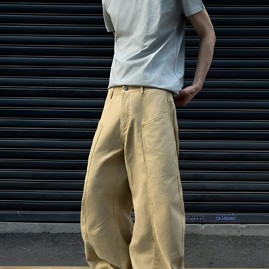 Men's straight leg khaki cotton trousers on a hanger, showing classic casual style.