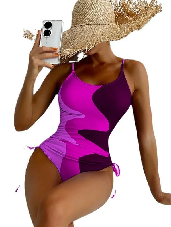 Blue women's sleeveless one-piece swimsuit for swimming sports on a mannequin.