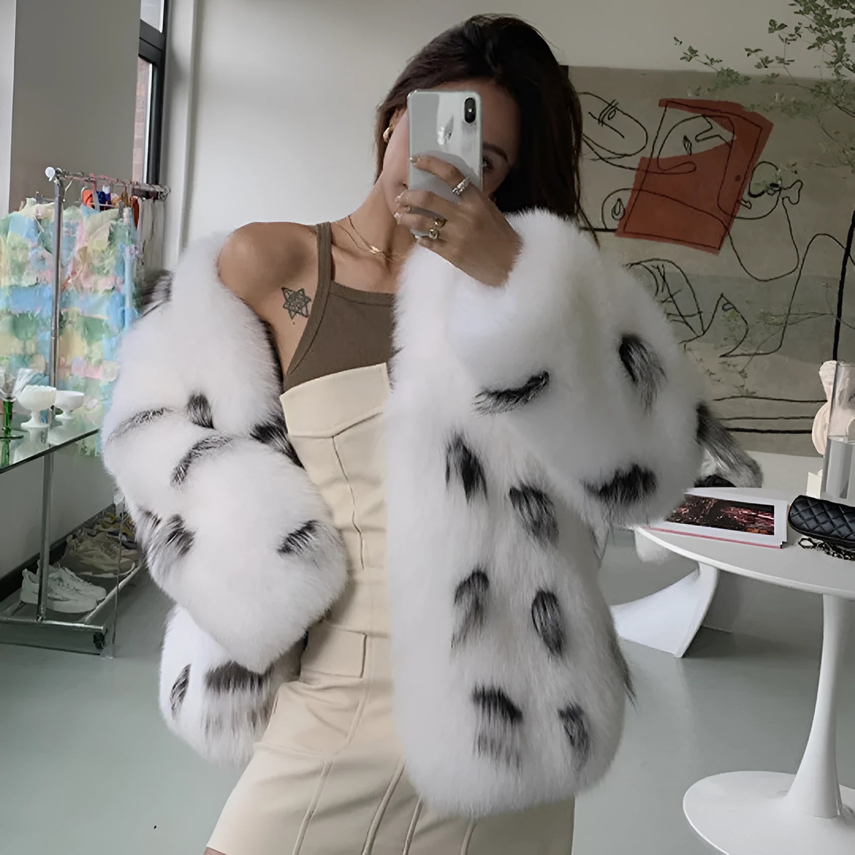 Women's black and white faux fur coat with slim fit and short length in Korean street style