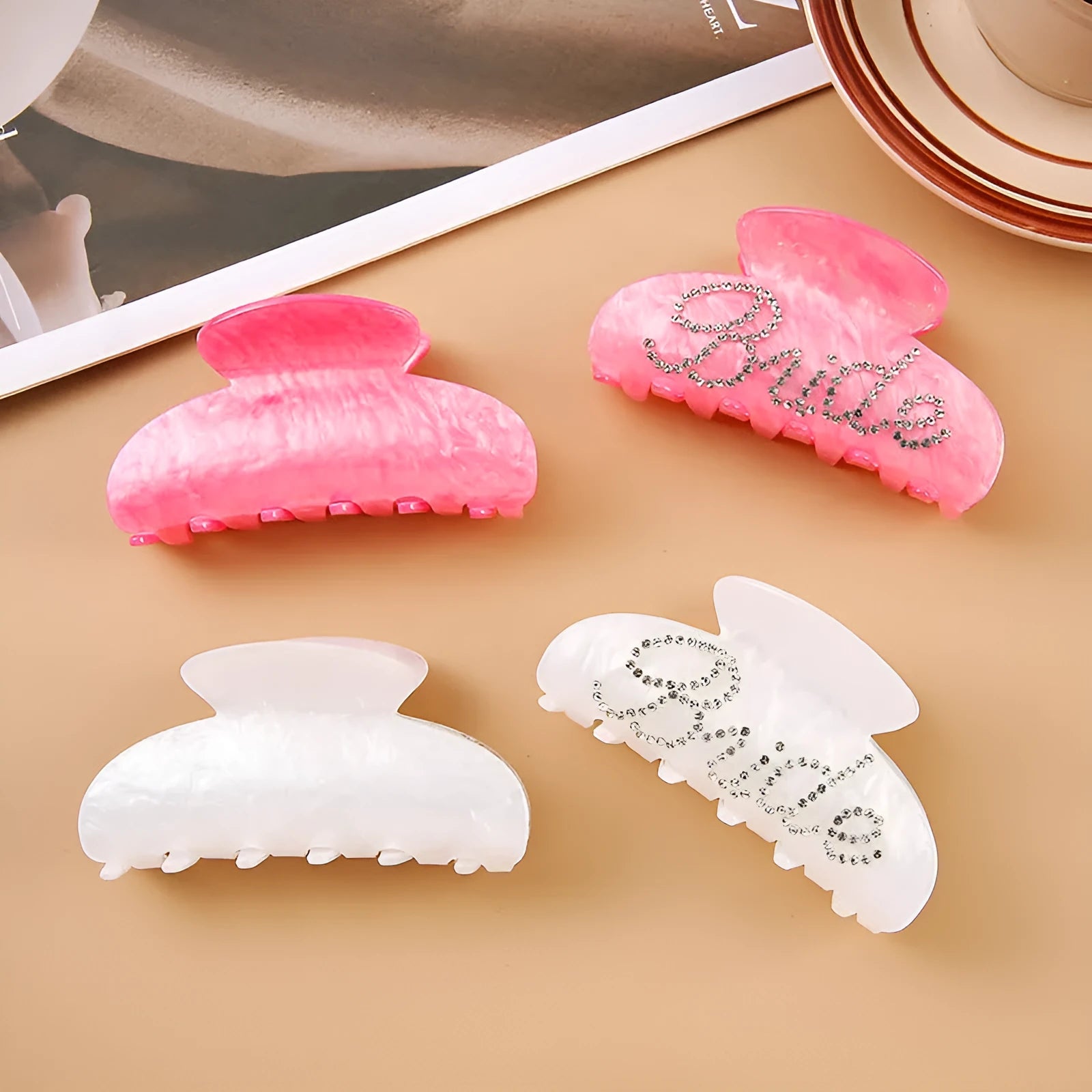 Pink and white acrylic shark clip hair barrettes with spot drill decoration on a sweet style