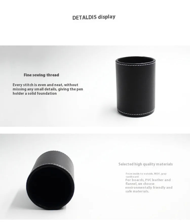Black leather round pen holder with cylindrical shape on a desk