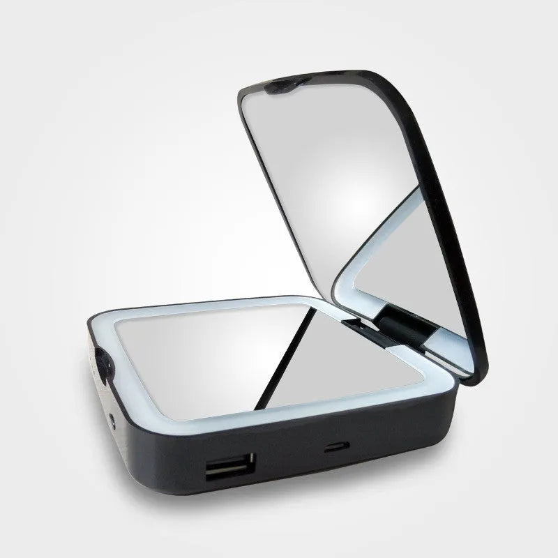 Makeup mirror with dual-sided design showing 4x magnification mirror and adjustable LED lighting system in black colour option
