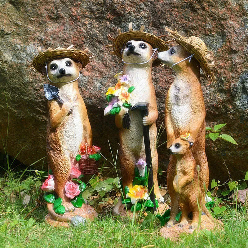 Yellow-brown resin mongoose garden ornaments with straw hats and gardening tools