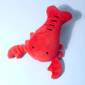 Red lobster stuffed dog toy with squeaker for small and medium breeds measuring 12.5 cm long